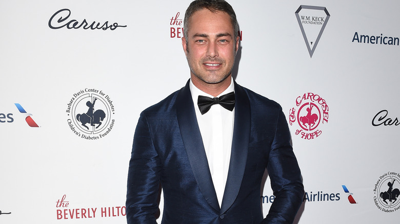 Taylor Kinney in smoking