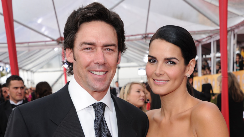 Angie Harmon posa con Jason Sehorn