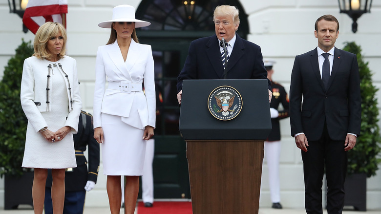 Brigitte Macron, Melania Trump, Donald Trump ed Emmanuel Macron