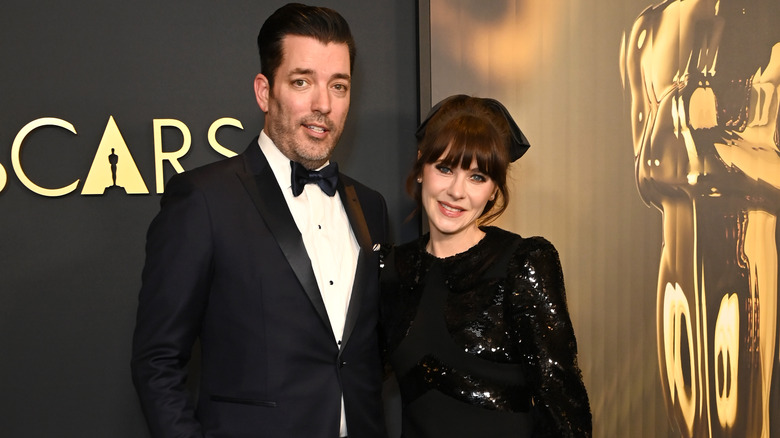 Jonathan Scott e Zooey Deschanel sorridono